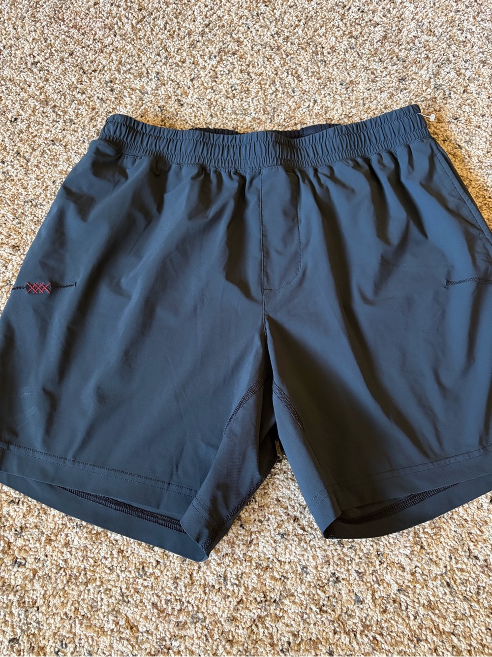 RHONE Men's Black Performance Training Shorts with Subtle Red Accent